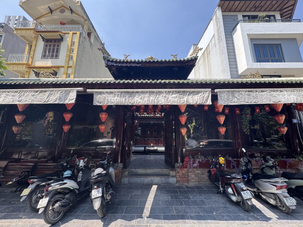 Exterior view of a traditional Vietnamese wooden cafe in Hanoi